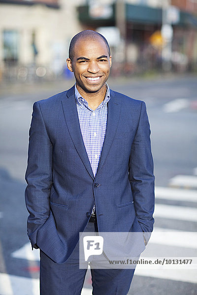 Smiling young man wearing suit