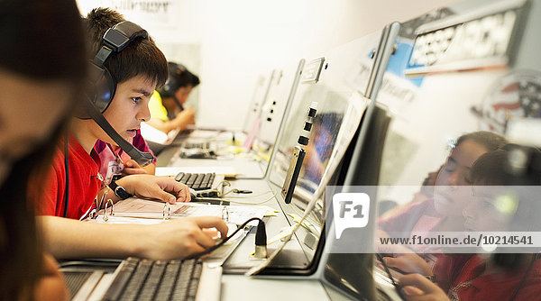 Students using computers at desk