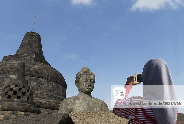 Tourist Statue fotografieren Buddha