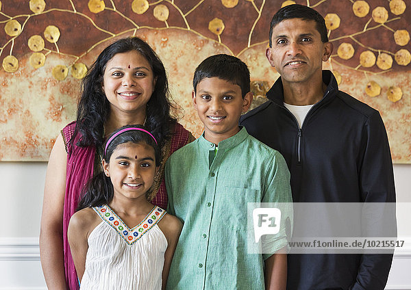 Close up of Indian family smiling