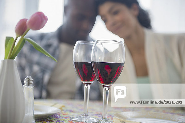 Couple with red wine in restaurant
