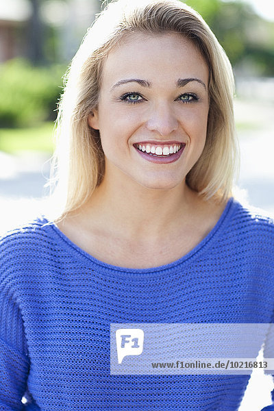 Close up of Caucasian woman smiling outdoors