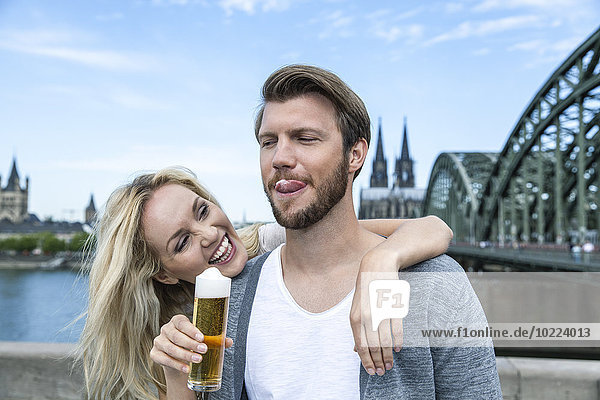 Germany  Cologne  young man tasting Koelsch
