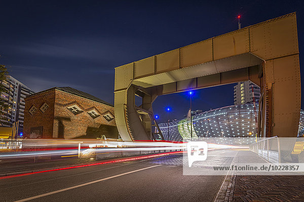 Germany  Bremerhaven  Klimahaus and lift bridge at night