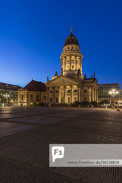 Germany  Berlin  lighted French Cathedral at Gendarmenmarkt in the evening
