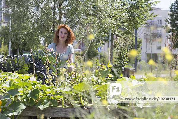 Young woman gardening  urban gardening