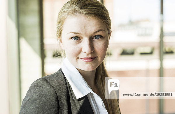 Portrait of confident young businesswoman