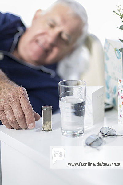 Patient in hospital taking medication