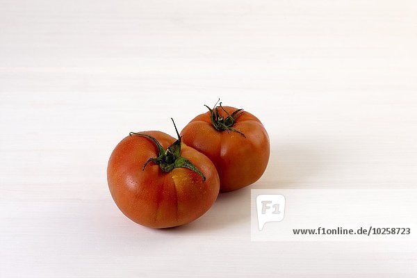 Tomatoes on a white background