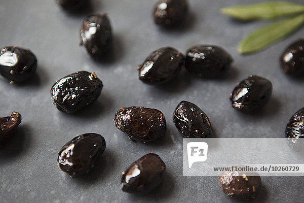Black olives on table