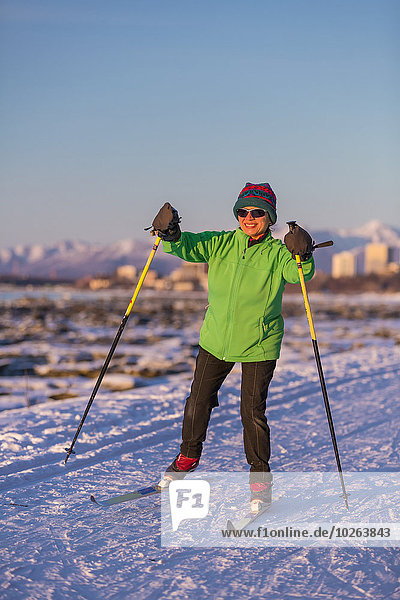 Close up of a Hispanic woman cross country skiing on the Tony Knowles Coastal Trail  Southcentral Alaska