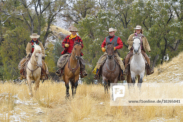 Vereinigte Staaten von Amerika USA Cowgirl Cowboy Rocky Mountains