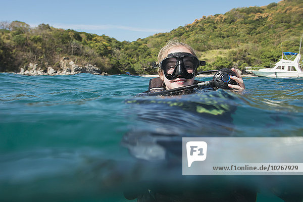 Scuba diver at the surface of the water; Ixtapa-Zihuatanejo  Guerrero  Mexico