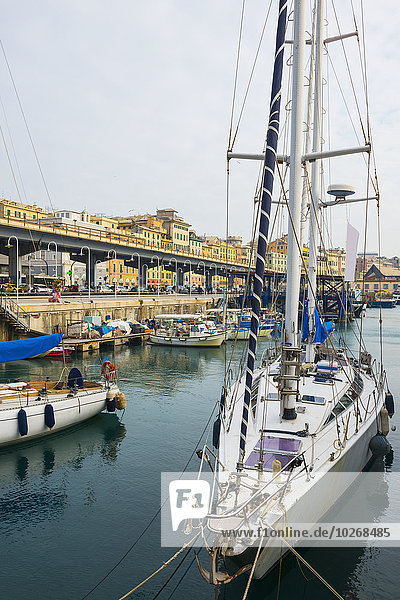 Sailboat moored in harbour; Genoa  Liguria  Italy