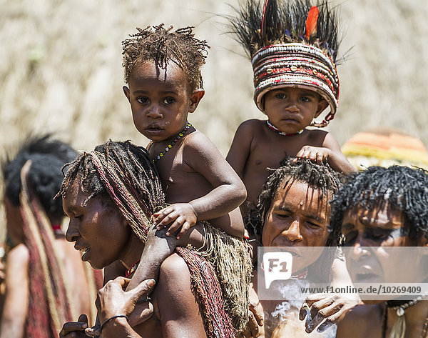 Dani women and children  Obia Village  Baliem Valley  Central Highlands of Western New Guinea  Papua  Indonesia