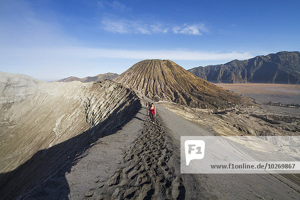 People on the rim of the crater of Mount Bromo  Bromo Tengger Semeru National Park  East Java  Indonesia