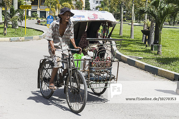 Man on a rickshaw  Medan  North Sumatra  Indonesia