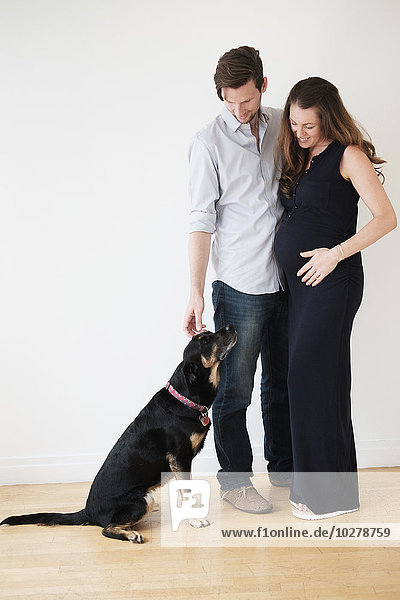 Portrait of couple with dog