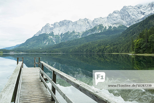 Zugspitze reflecting in Eibsee lake Bavaria Germany