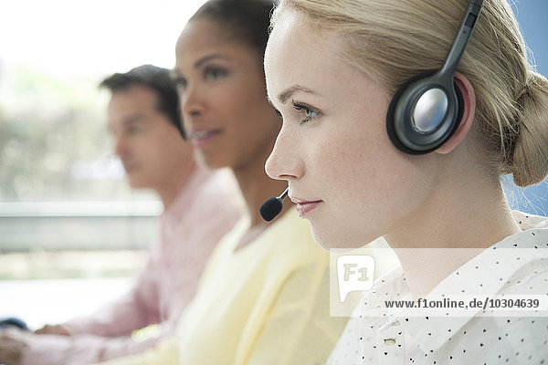 Telemarketers at work in call center
