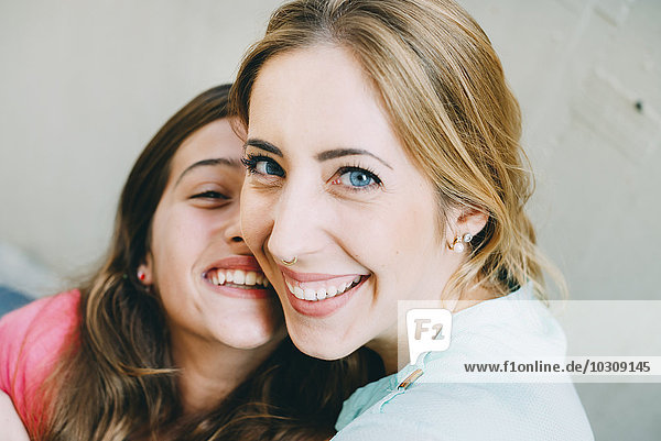 Laughing young woman and girl