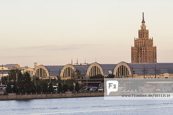 Latvia  Riga  Academy of Science and market hall behind the Daugava river