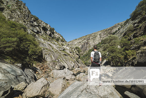 Spain  Galicia  A Capela  Ultra trail runner at the canyon of Eume river
