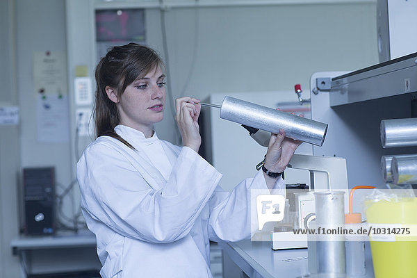 Young female natural scientist working at microbiology laboratory