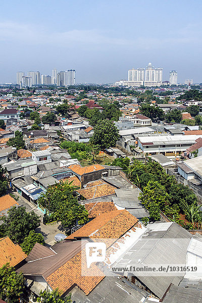 Indonesia  Jakarta  Cityview  Deprived area in foreground