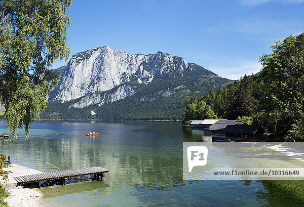Austria  Styria  Altaussee  boat on lake with Trisselwand at Totes Gebirge