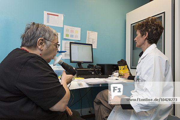 To be used in the context of the reportage only. Reportage on the medical check-up process in the Health Education and Prevention Centre in Lille´s Institut Pasteur (IPL) in France. A pre-clinical exam by a nurse : spirometry test.