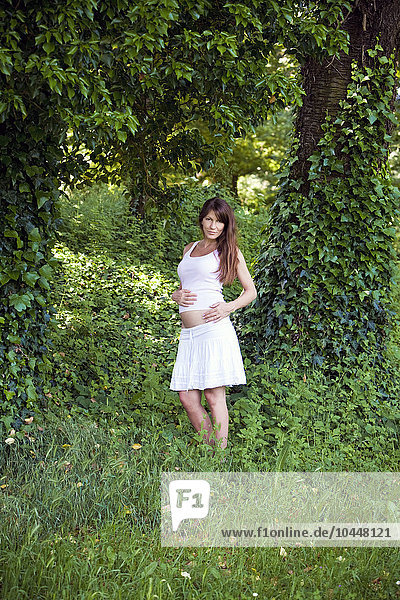 pregnant woman in a park