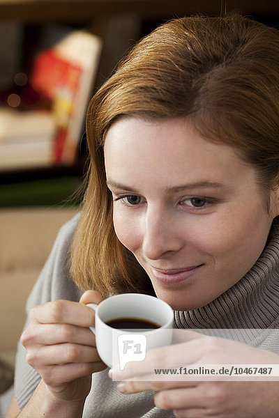 WOMAN WITH HOT DRINK