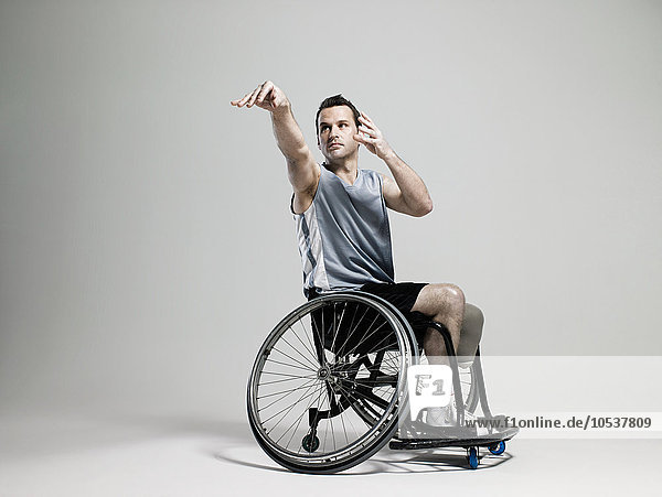 Wheelchair basketball player shooting
