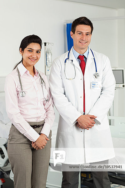 Portrait of male and female doctors