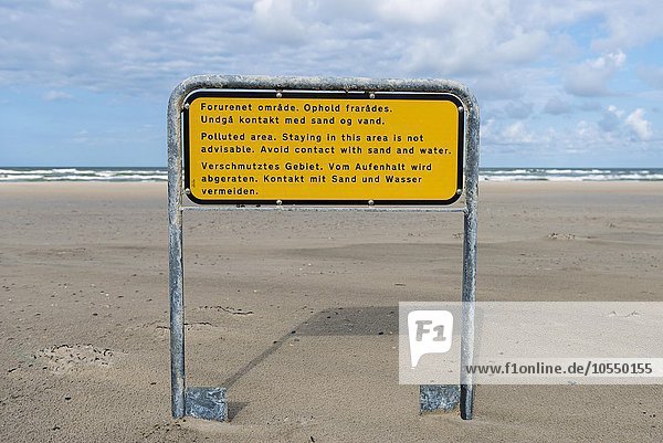 Warning sign  polluted area at Henne Mølle Å beach south  Oksböl  Region of Southern Denmark  Denmark  Europe