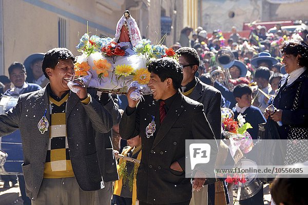 Procession during a fiesta in Colquechaca in Potosi  Bolivia  South America