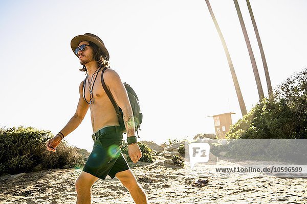 Young man exploring Newport Beach  California  USA