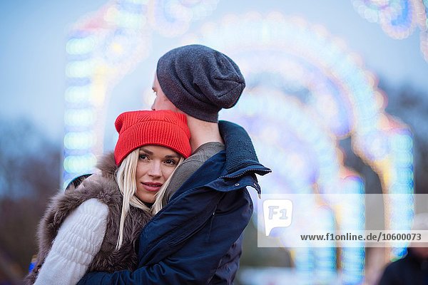 Romantic young couple at xmas festival in Hyde Park  London  UK