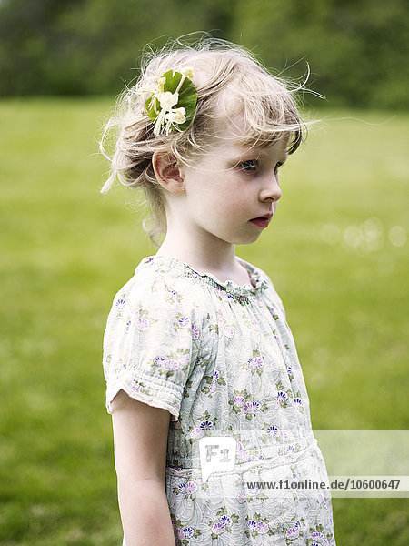 Portrait of girl wearing flowers in hair