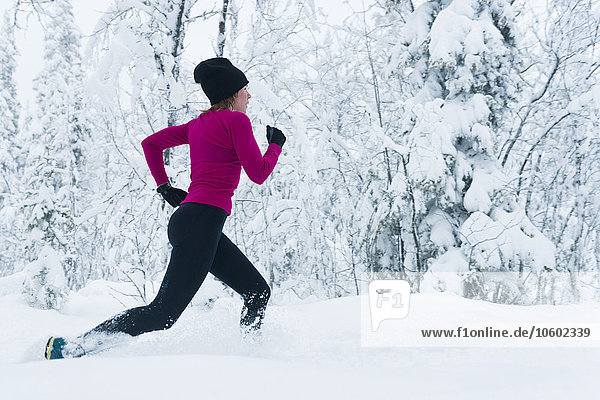 Woman running at winter  Sweden