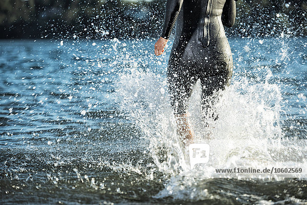 Woman in wetsuit in sea  Sweden