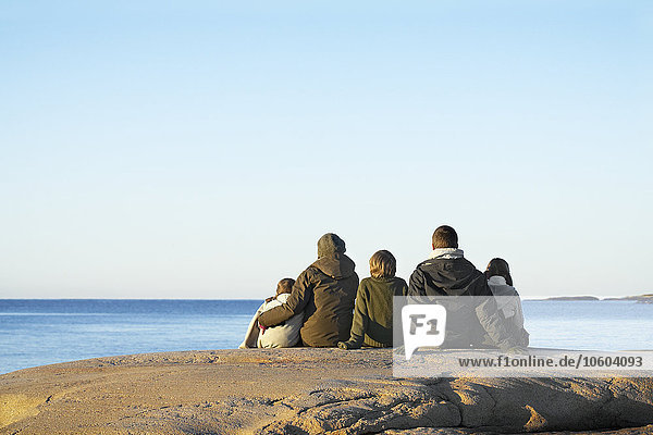 Family looking at sea