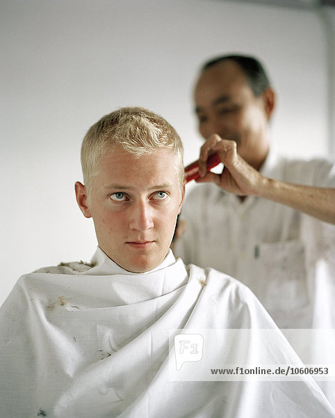 A Scandinavian man at a barber.