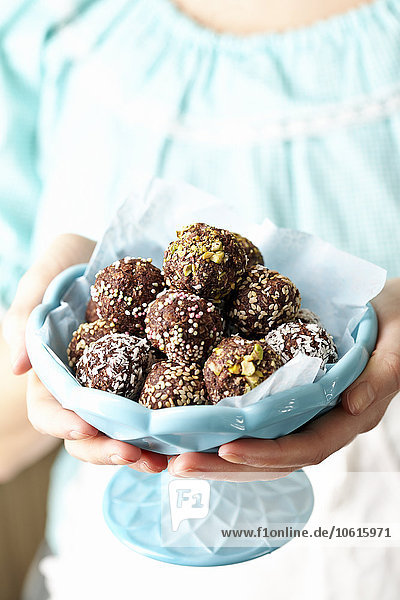 Woman holding home-made truffles