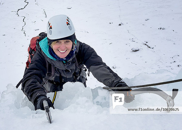 UK  Scotland  Glencoe  Ben Udlaih  woman ice climbing