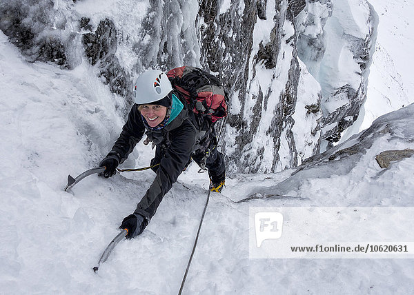 UK  Scotland  Glencoe  Ben Udlaih  woman ice climbing