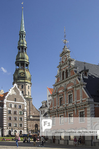 Latvia  Riga  Townhall Square with St. Peter's Church and House of the Blackheads