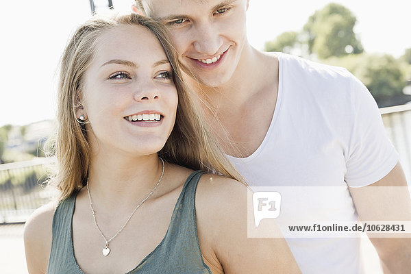 Smiling young couple in love