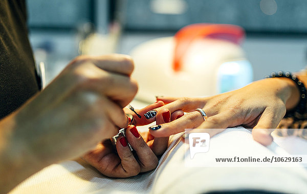 Nail grooming in beauty salon